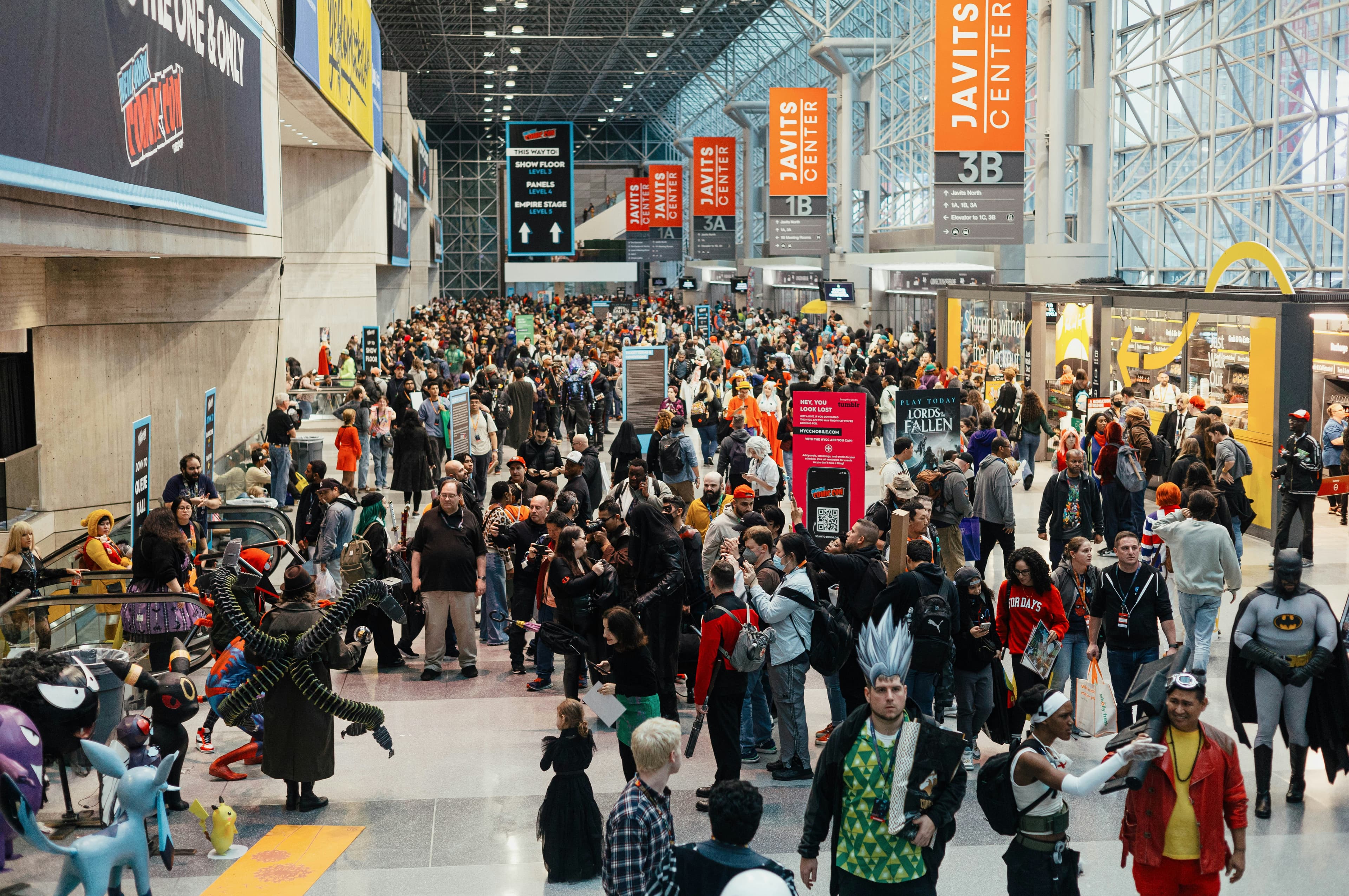Cosplay convention event with photographers and cosplayers gathering